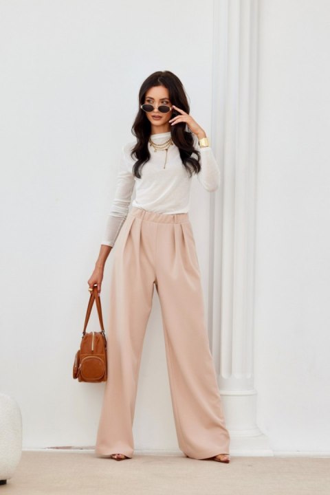 Ginny - długie spodnie z szerokimi nogawkami i elastyczną talią Roco Fashion Ginny - długie spodnie z szerokimi nogawkami i elastyczną talią Roco Fashion