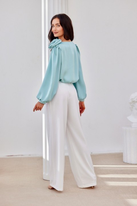 Ginny - długie spodnie z szerokimi nogawkami i elastyczną talią Roco Fashion Ginny - długie spodnie z szerokimi nogawkami i elastyczną talią Roco Fashion